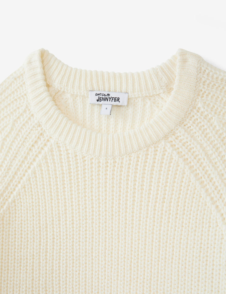 Pull blanc en maille tressée