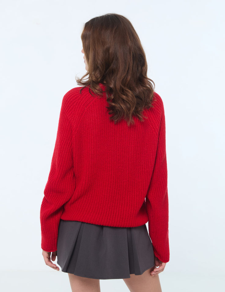 Pull en maille tressée rouge