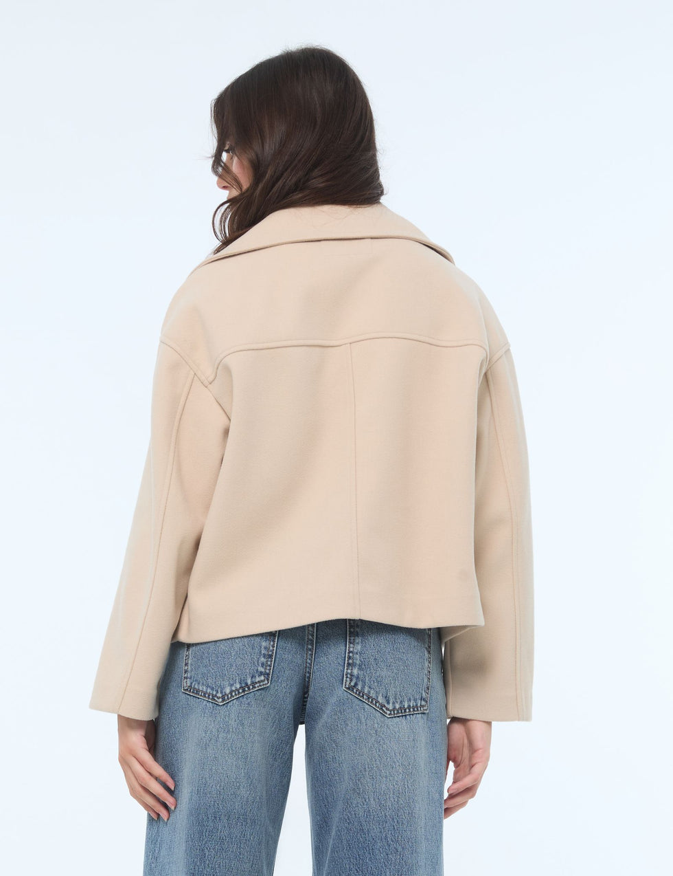 Manteau court coupe trench beige