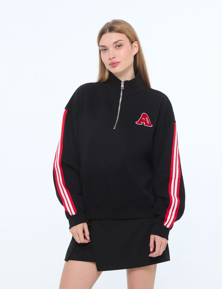 Sweat oversize noir avec bandes rouges