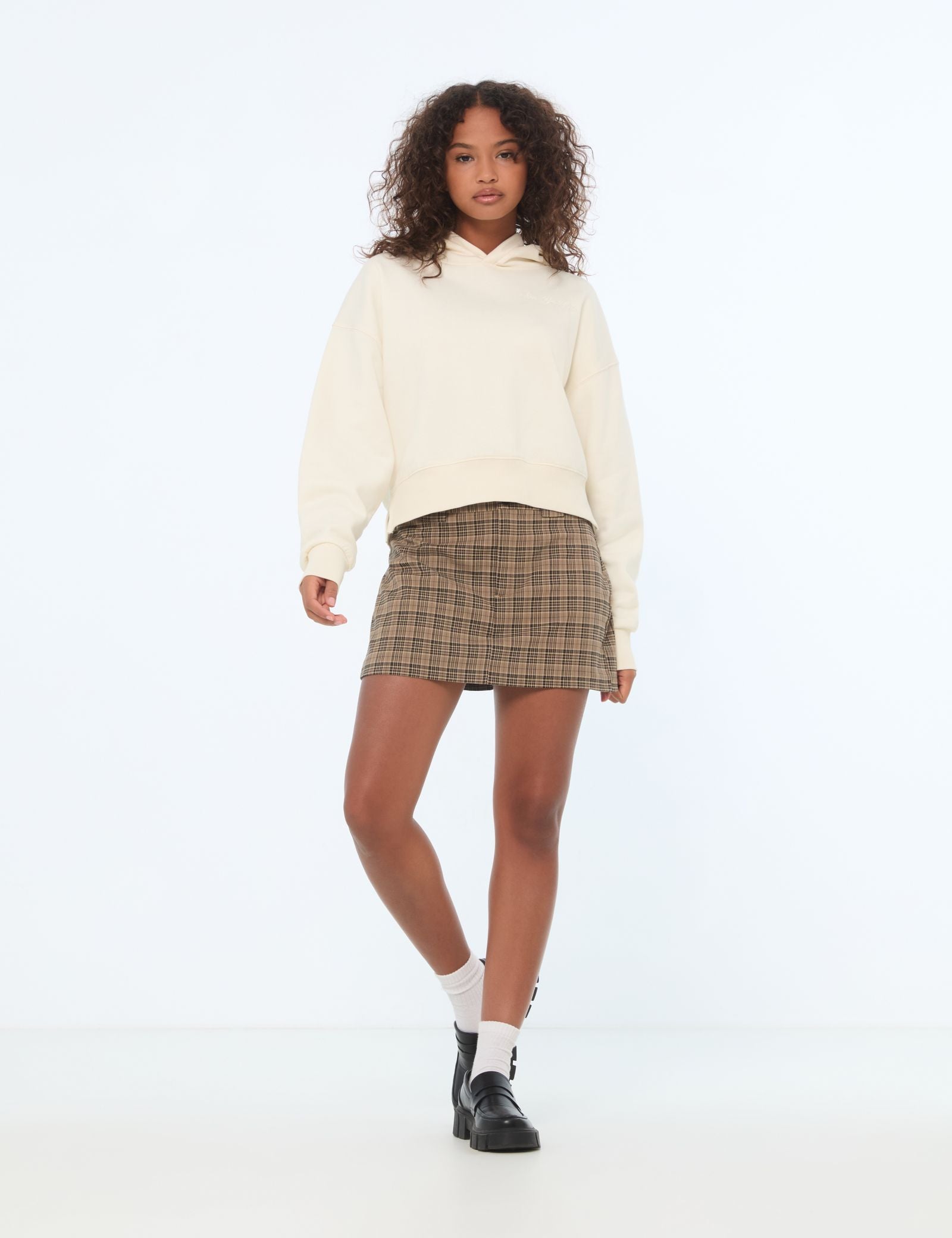 Jupe short courte a carreaux marron Jennyfer