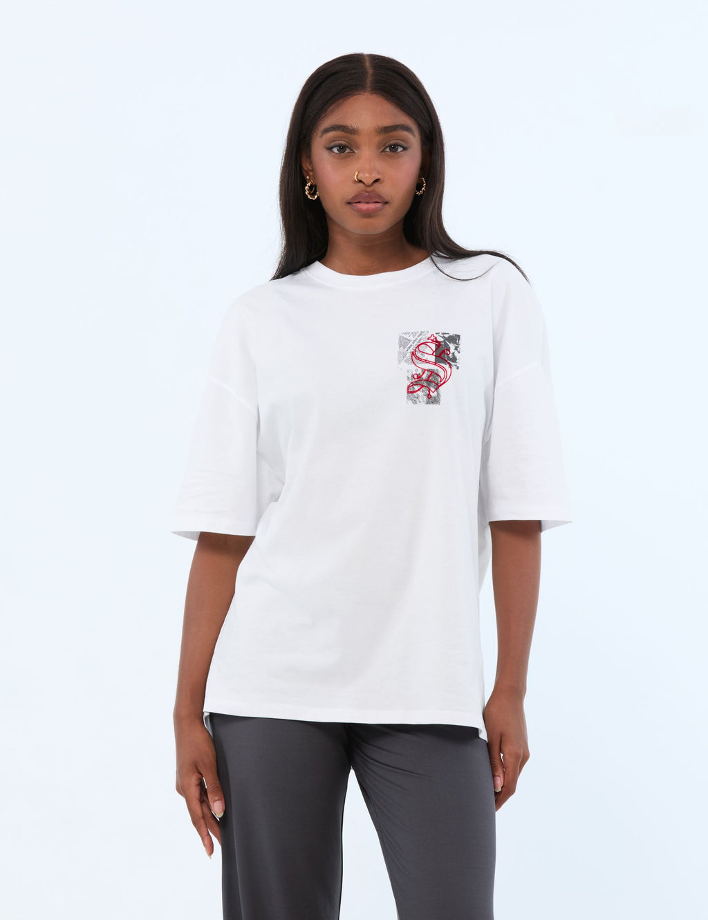 T-shirt oversize à motif journal blanc