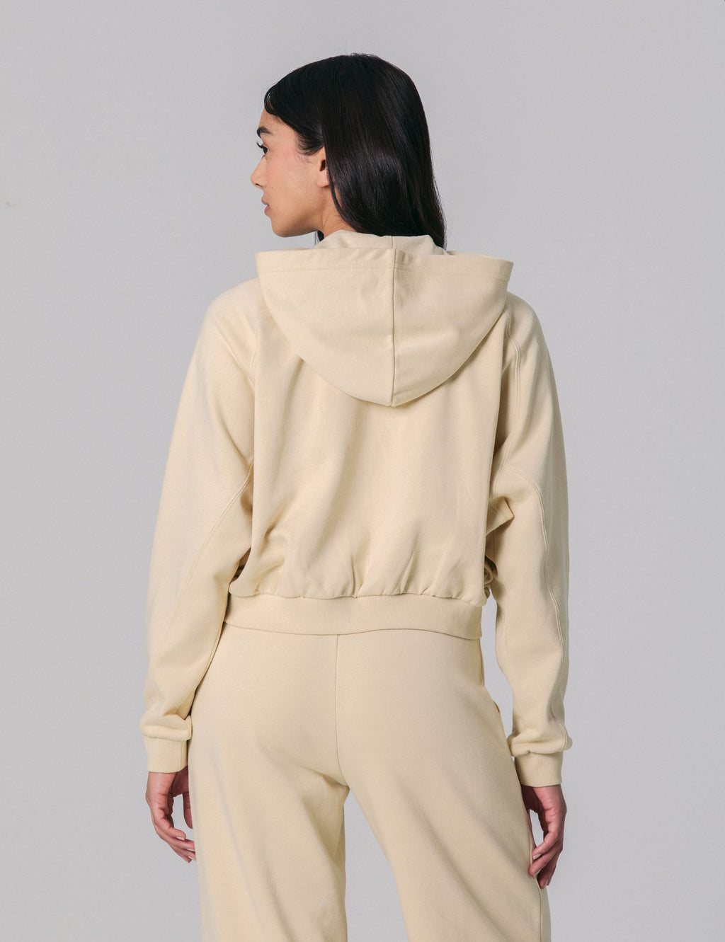 Sweat zippé court à capuche beige clair